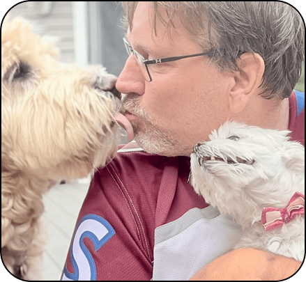 Aspen and Bella greeting Larry when he got home from work.